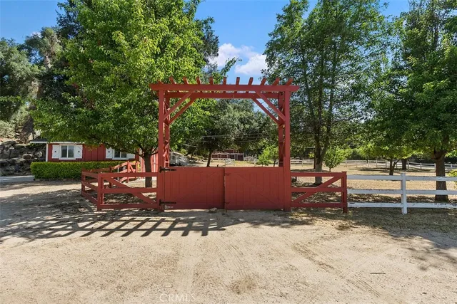 a backyard of a house with lots of green space