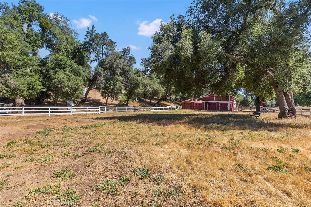 35455 El Niguel Road Lake Elsinore, CA 92530 - Photo 50 of 58 a view of a house with swimming pool