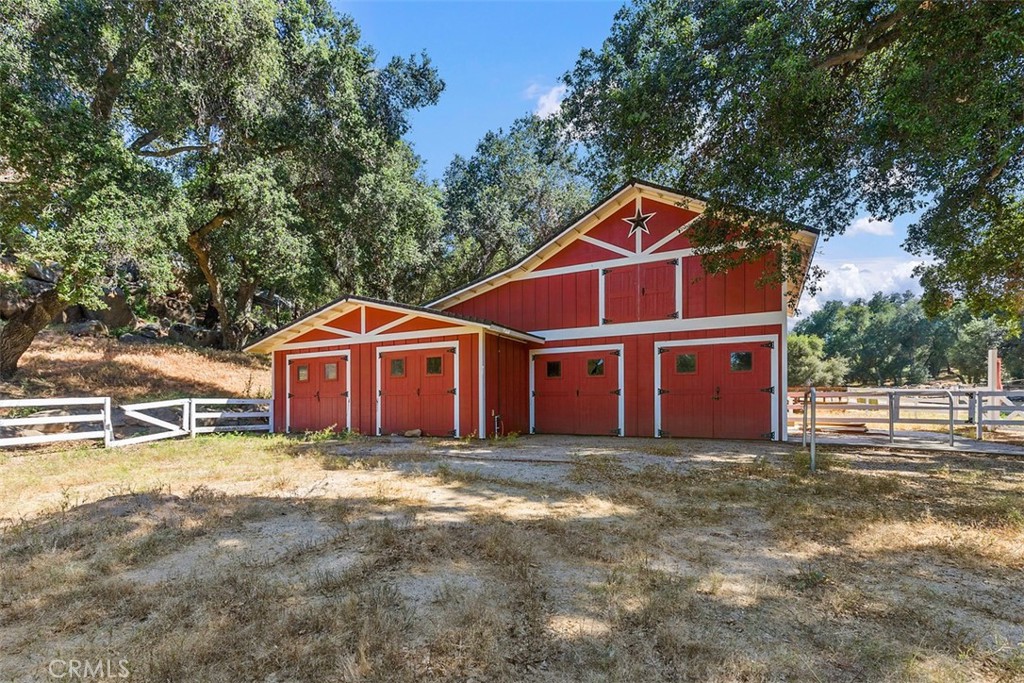 35455 El Niguel Road Lake Elsinore, CA 92530 - Photo 51 of 58 a view of a house with a yard