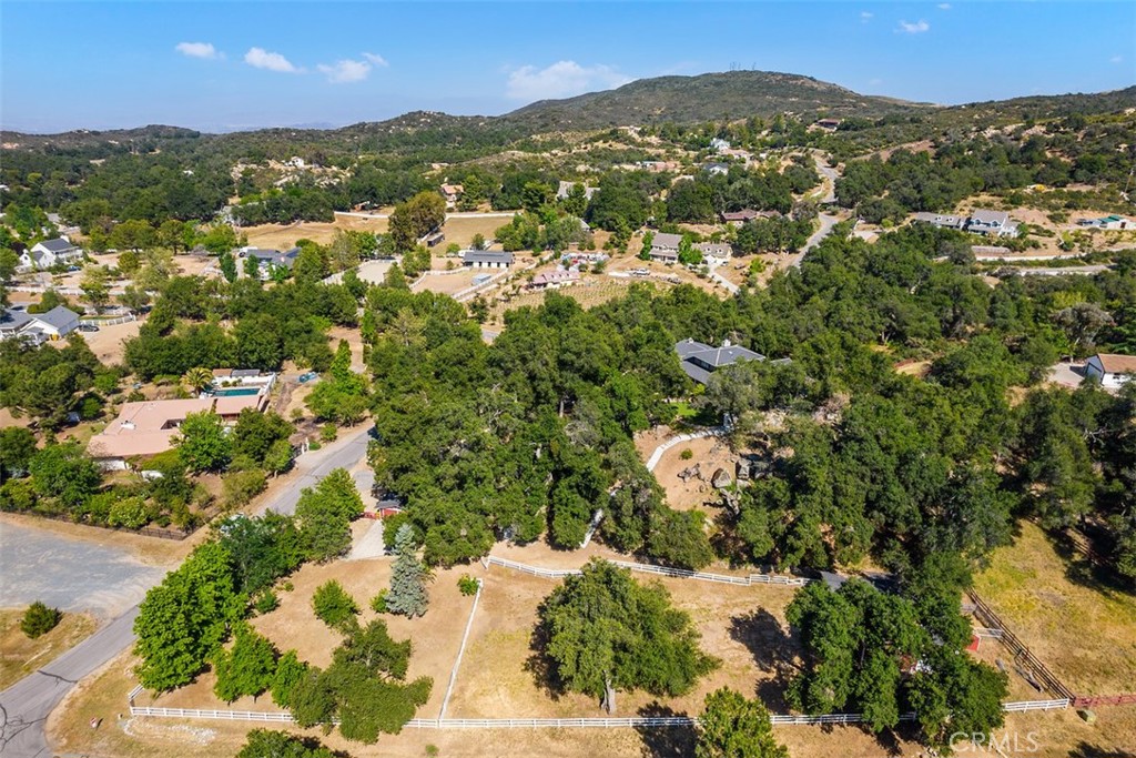 35455 El Niguel Road Lake Elsinore, CA 92530 - Photo 7 of 58 an aerial view of residential houses with outdoor space and trees
