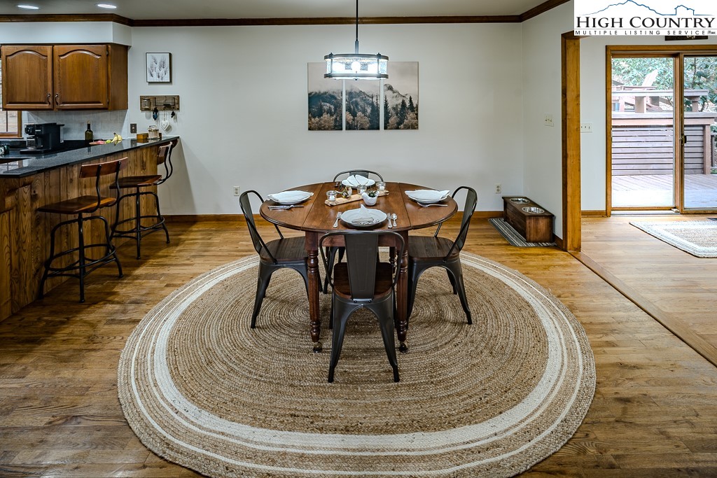 281 Old Hartley Road Banner Elk, NC 28604 - Photo 12 of 50 a view of a dining room with furniture