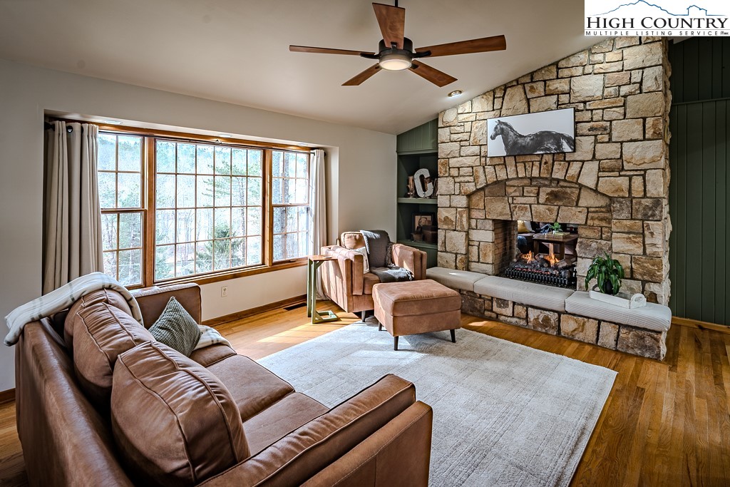 281 Old Hartley Road Banner Elk, NC 28604 - Photo 18 of 50 a living room with furniture fireplace and flat screen tv