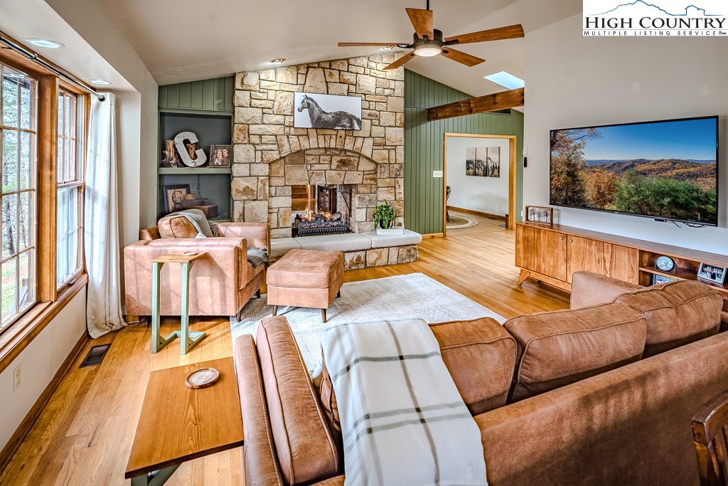 281 Old Hartley Road Banner Elk, NC 28604 - Photo 3 of 50 a living room with furniture and a flat screen tv