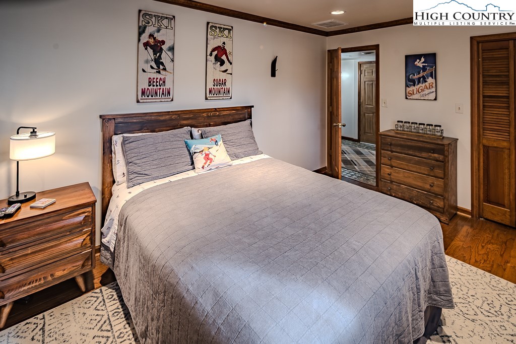 281 Old Hartley Road Banner Elk, NC 28604 - Photo 33 of 50 a bedroom with a bed and closet