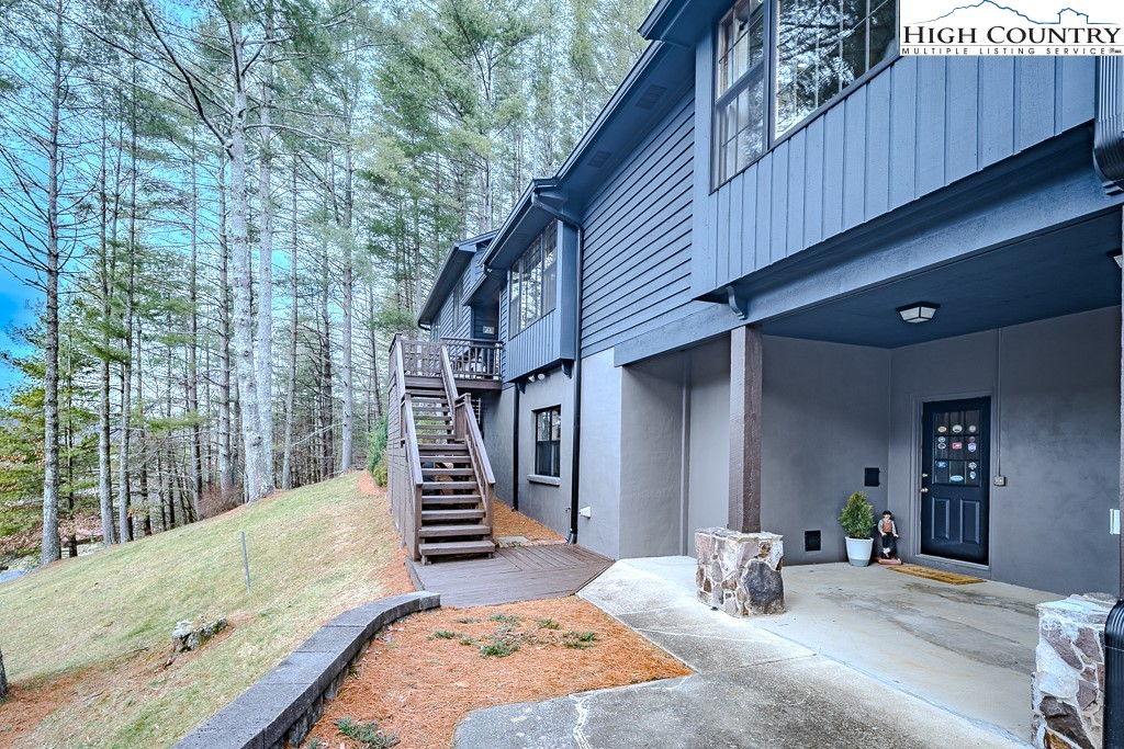 281 Old Hartley Road Banner Elk, NC 28604 - Photo 6 of 50 a view of a patio with a table and chairs
