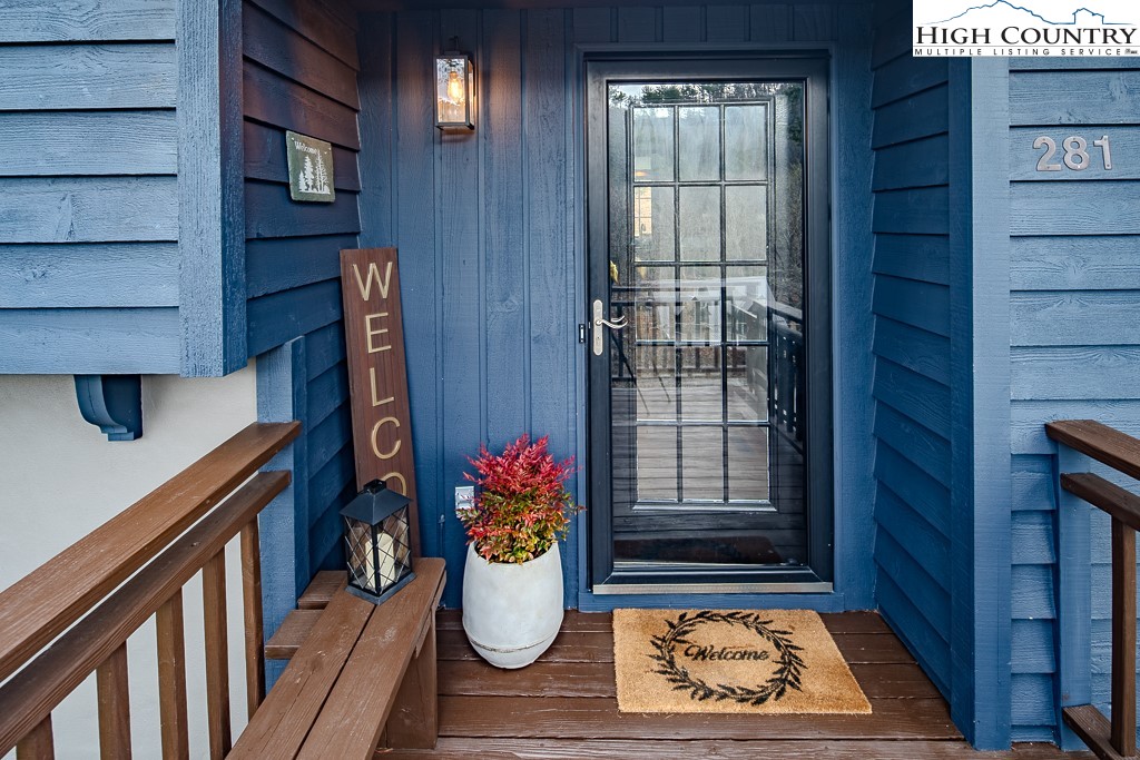 281 Old Hartley Road Banner Elk, NC 28604 - Photo 7 of 50 a view of entryway with wooden floor