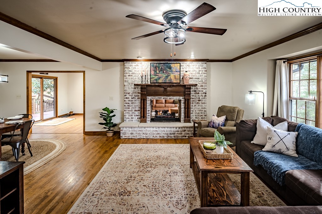 281 Old Hartley Road Banner Elk, NC 28604 - Photo 8 of 50 a living room with furniture and a fireplace