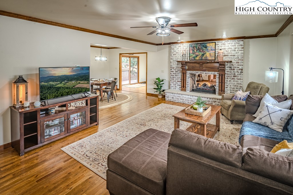 281 Old Hartley Road Banner Elk, NC 28604 - Photo 9 of 50 a living room with furniture and a flat screen tv