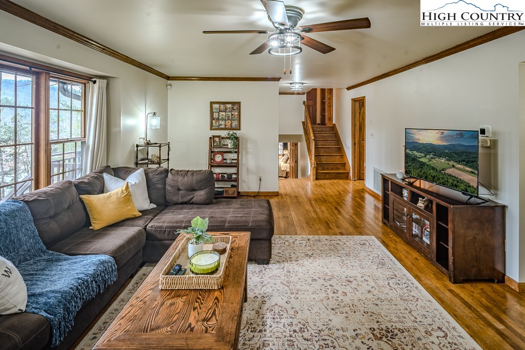 281 Old Hartley Road Banner Elk, NC 28604 - Photo 10 of 50 a living room with furniture and a flat screen tv