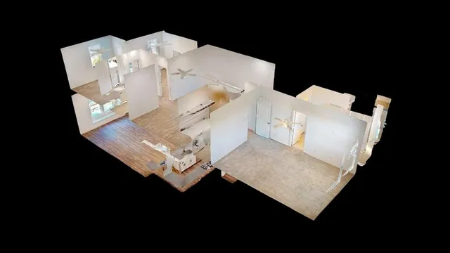 a white house with black and white appliances