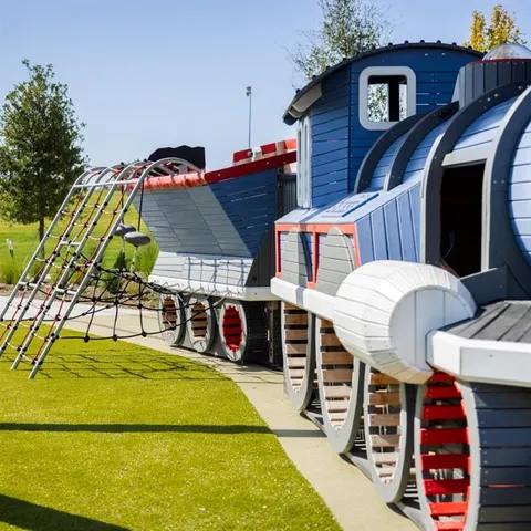 a view of a chairs and table in the patio