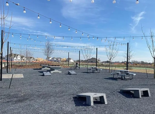 a view of a swimming pool with a lounge chair
