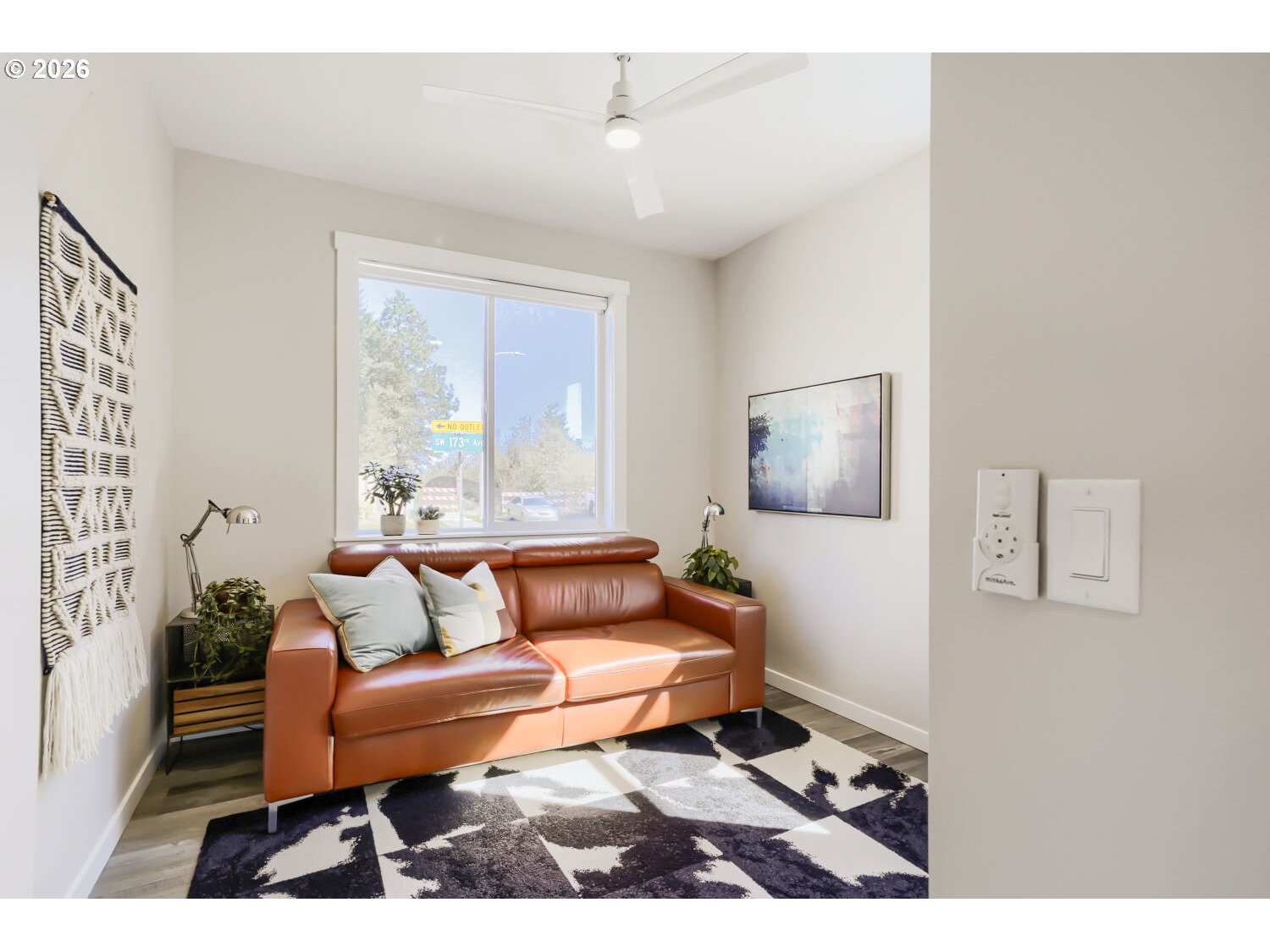 9957 Southwest 173rd Avenue Beaverton, OR 97007 - Photo 19 of 45 a living room with furniture and a window