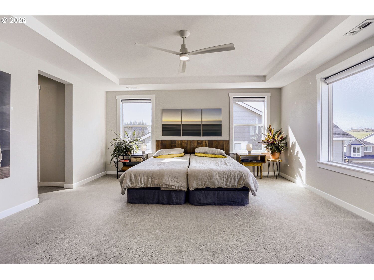 9957 Southwest 173rd Avenue Beaverton, OR 97007 - Photo 25 of 45 a bedroom with a bed and window