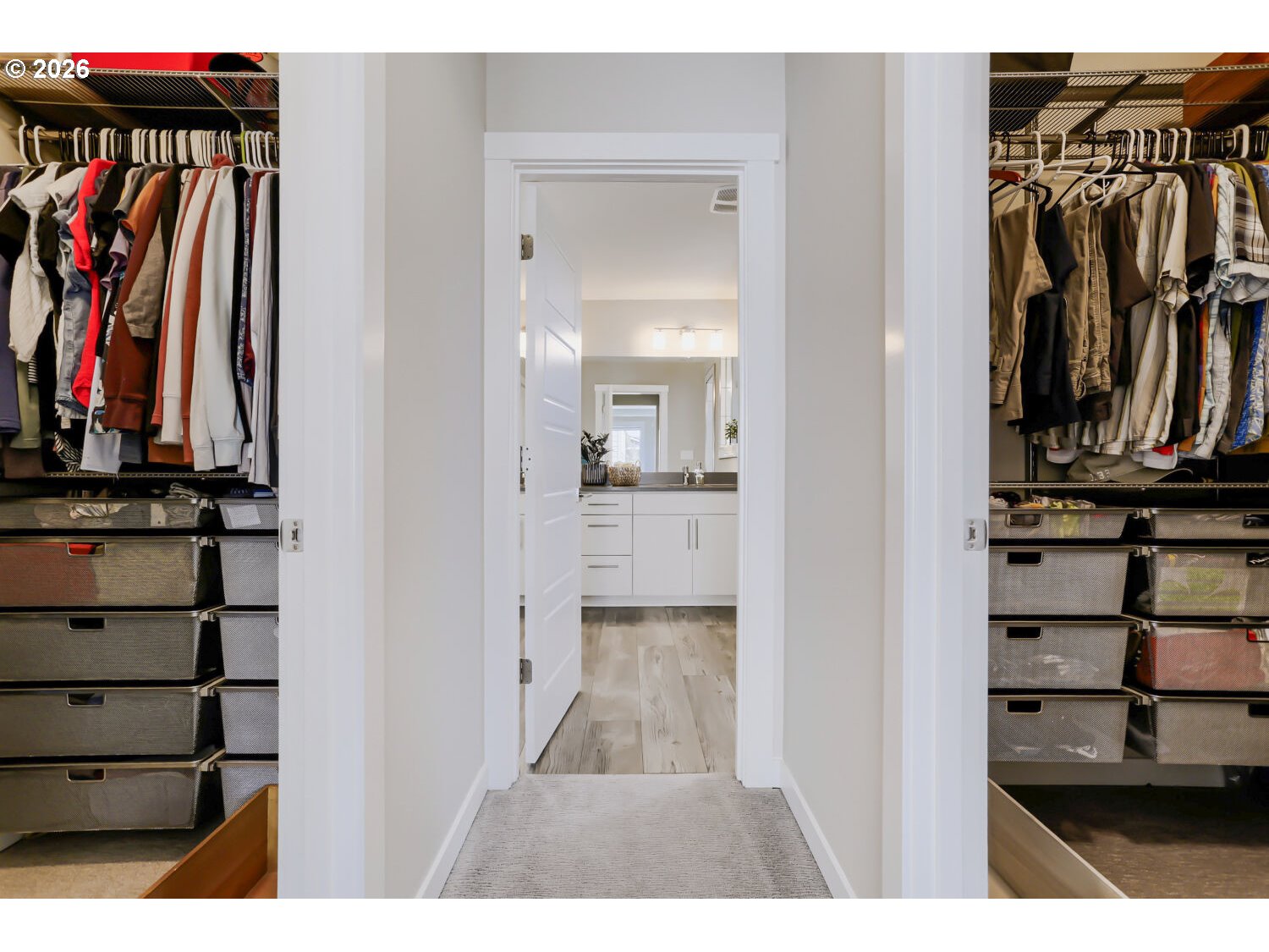 9957 Southwest 173rd Avenue Beaverton, OR 97007 - Photo 26 of 45 a view of walk in closet with clothes and shoes