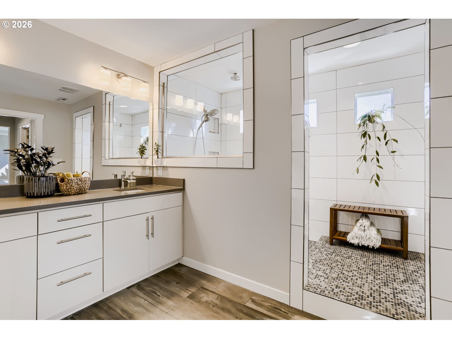 9957 Southwest 173rd Avenue Beaverton, OR 97007 - Photo 28 of 45 a bathroom with a sink and a mirror