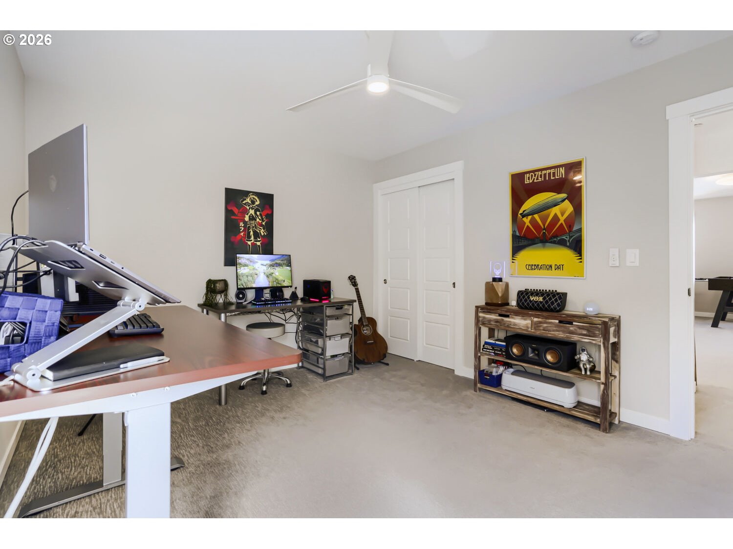 9957 Southwest 173rd Avenue Beaverton, OR 97007 - Photo 37 of 45 a living room with furniture and a flat screen tv