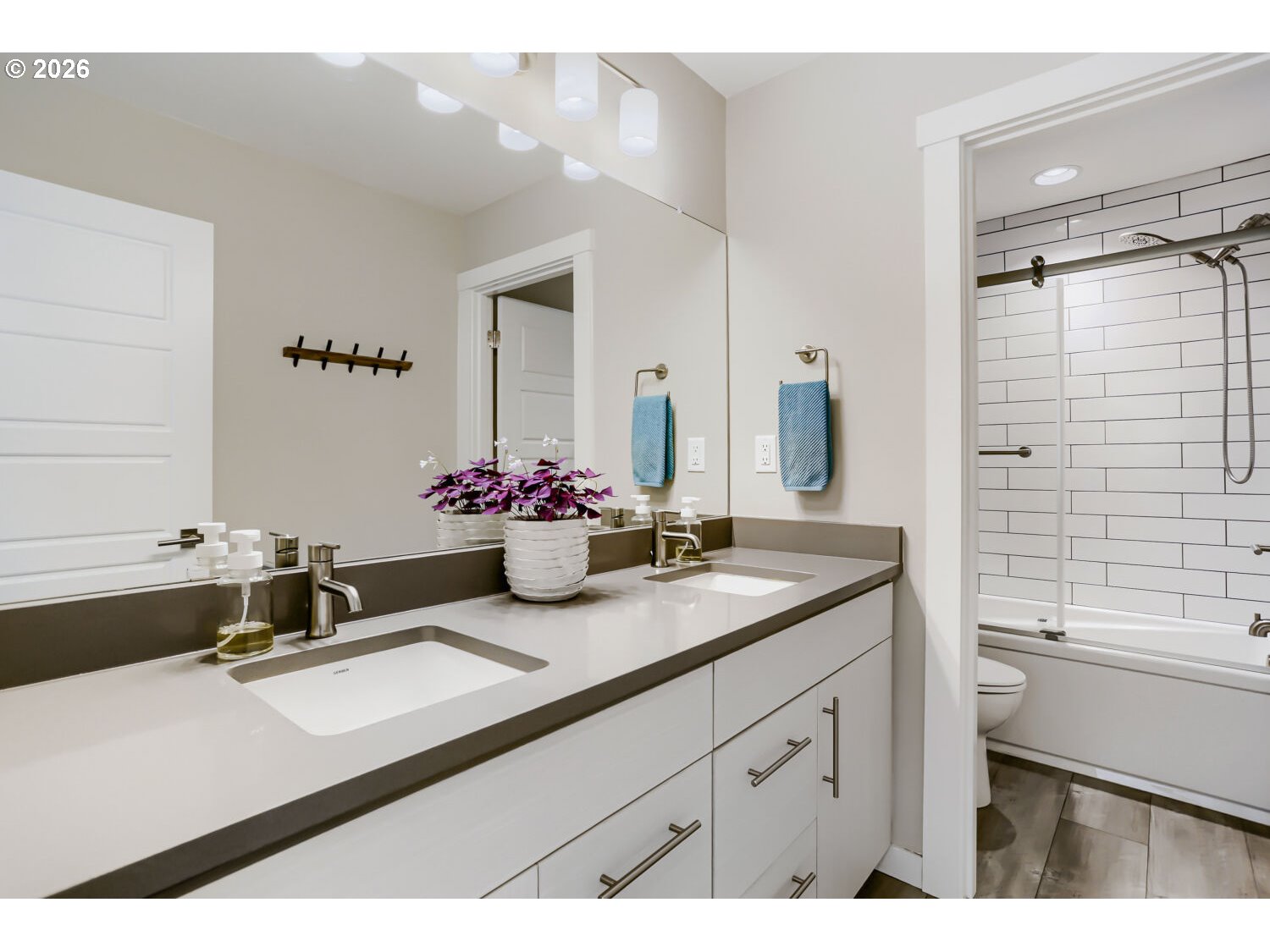 9957 Southwest 173rd Avenue Beaverton, OR 97007 - Photo 38 of 45 a bathroom with a sink and a mirror