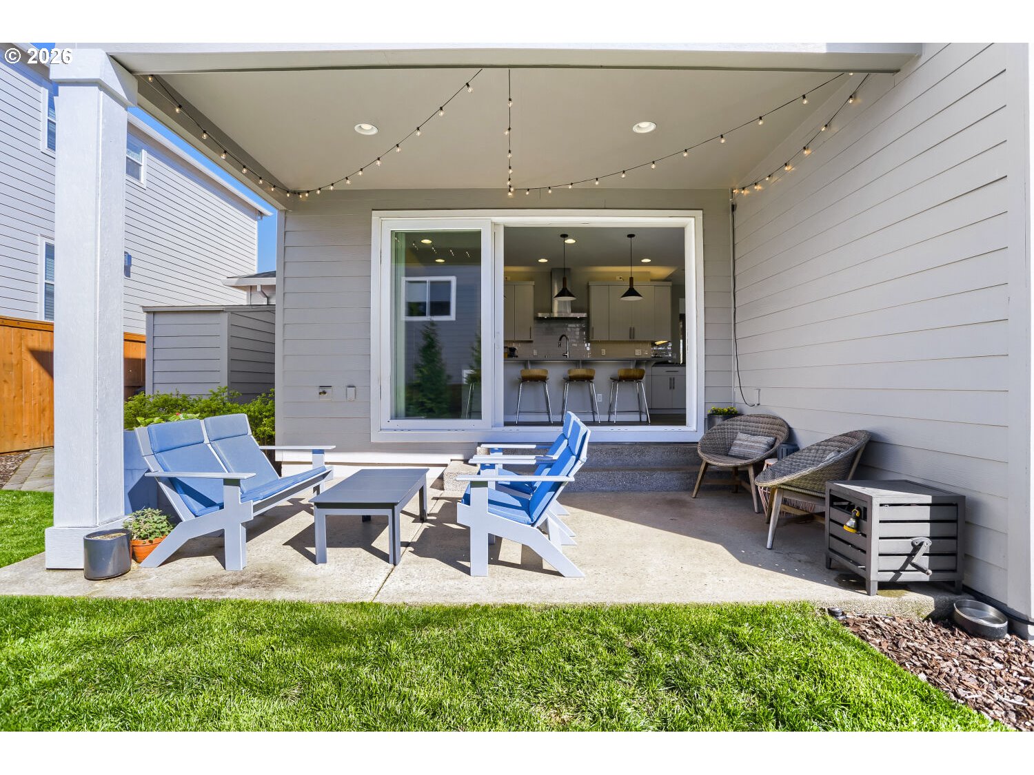 9957 Southwest 173rd Avenue Beaverton, OR 97007 - Photo 40 of 45 a view of a patio with table and chairs and potted plants