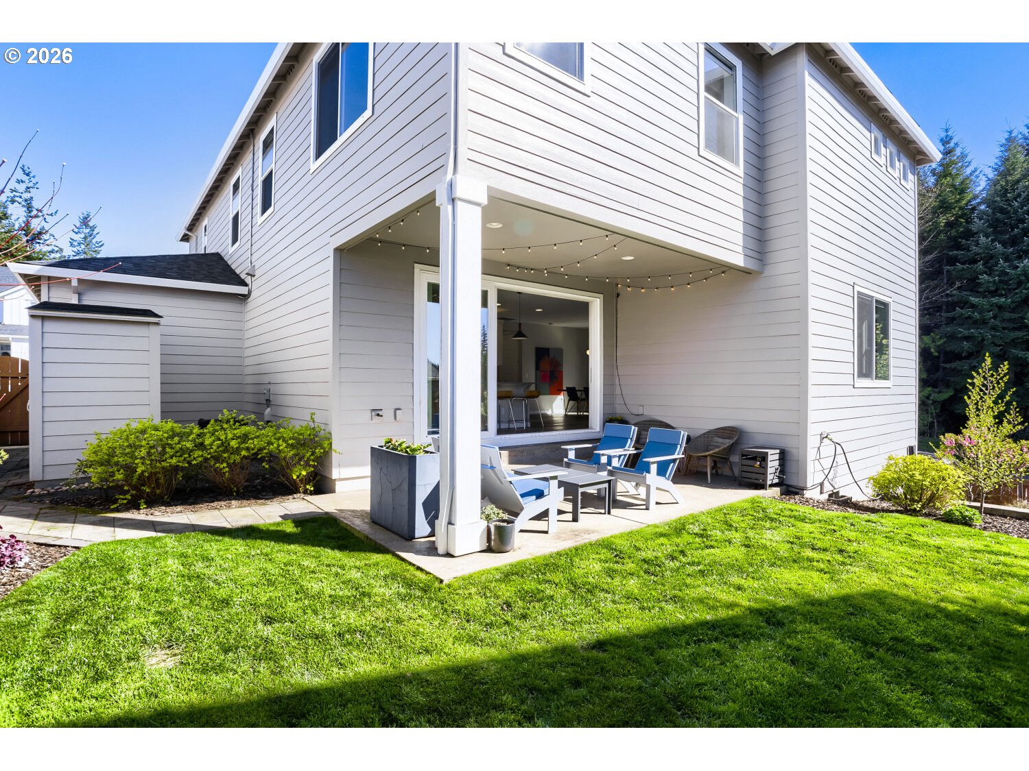 9957 Southwest 173rd Avenue Beaverton, OR 97007 - Photo 41 of 45 a view of a house with backyard and sitting area