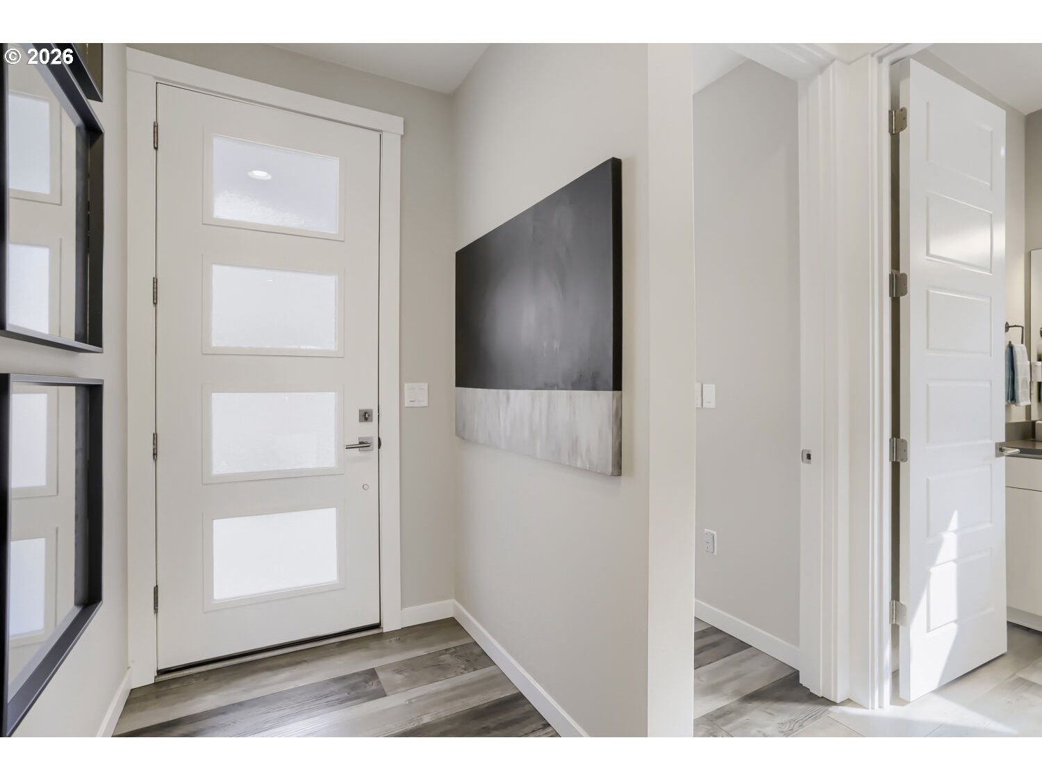 9957 Southwest 173rd Avenue Beaverton, OR 97007 - Photo 6 of 45 a view of a living room with a wooden floor