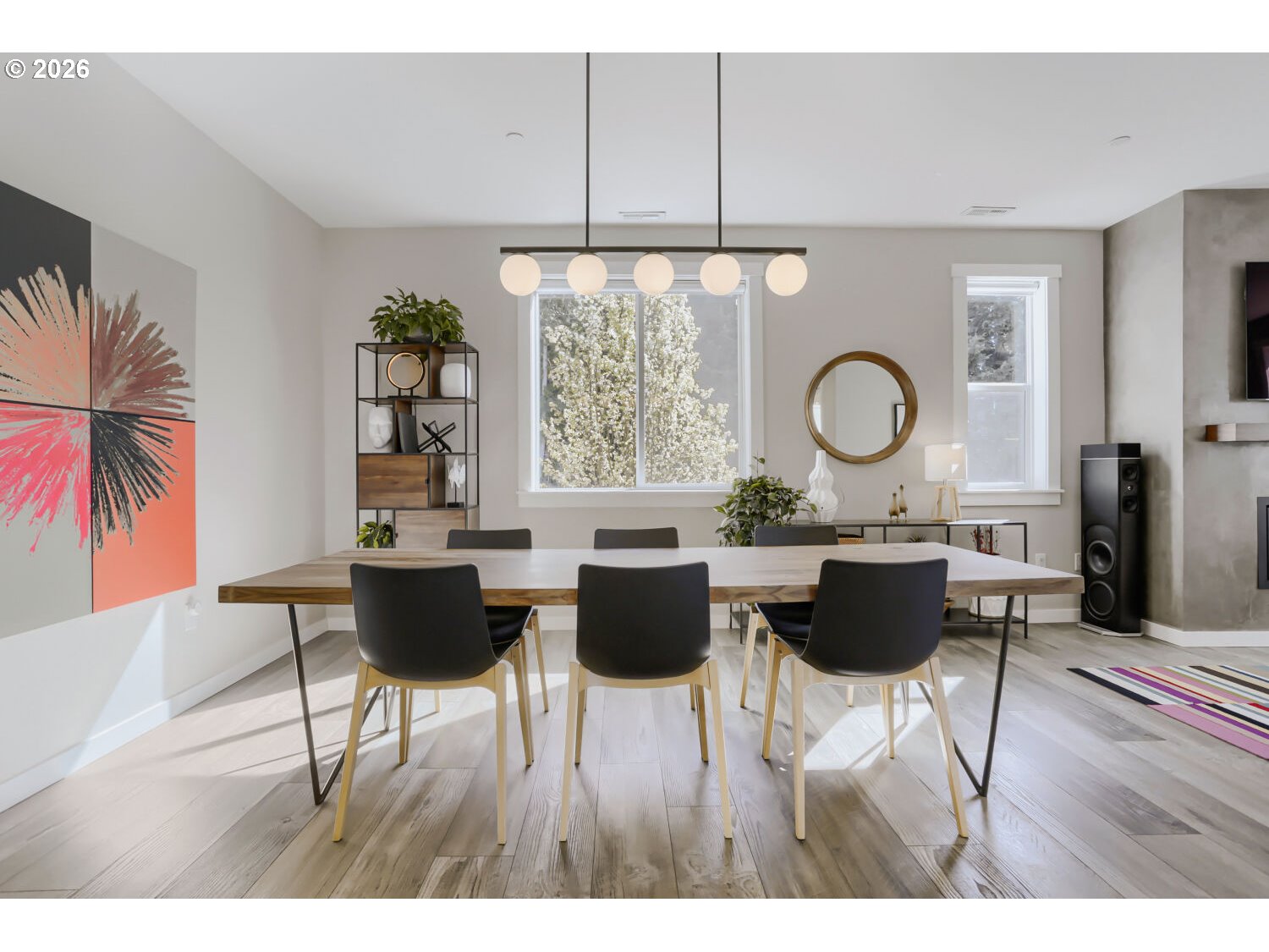 9957 Southwest 173rd Avenue Beaverton, OR 97007 - Photo 8 of 45 a view of a dining room with furniture and wooden floor