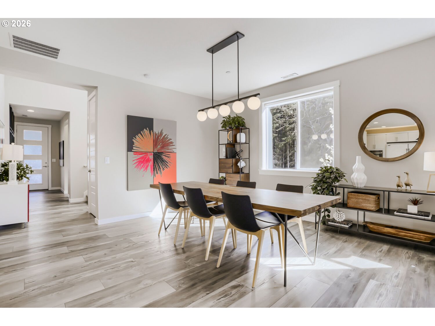 9957 Southwest 173rd Avenue Beaverton, OR 97007 - Photo 9 of 45 a living room with furniture dining table and a large window