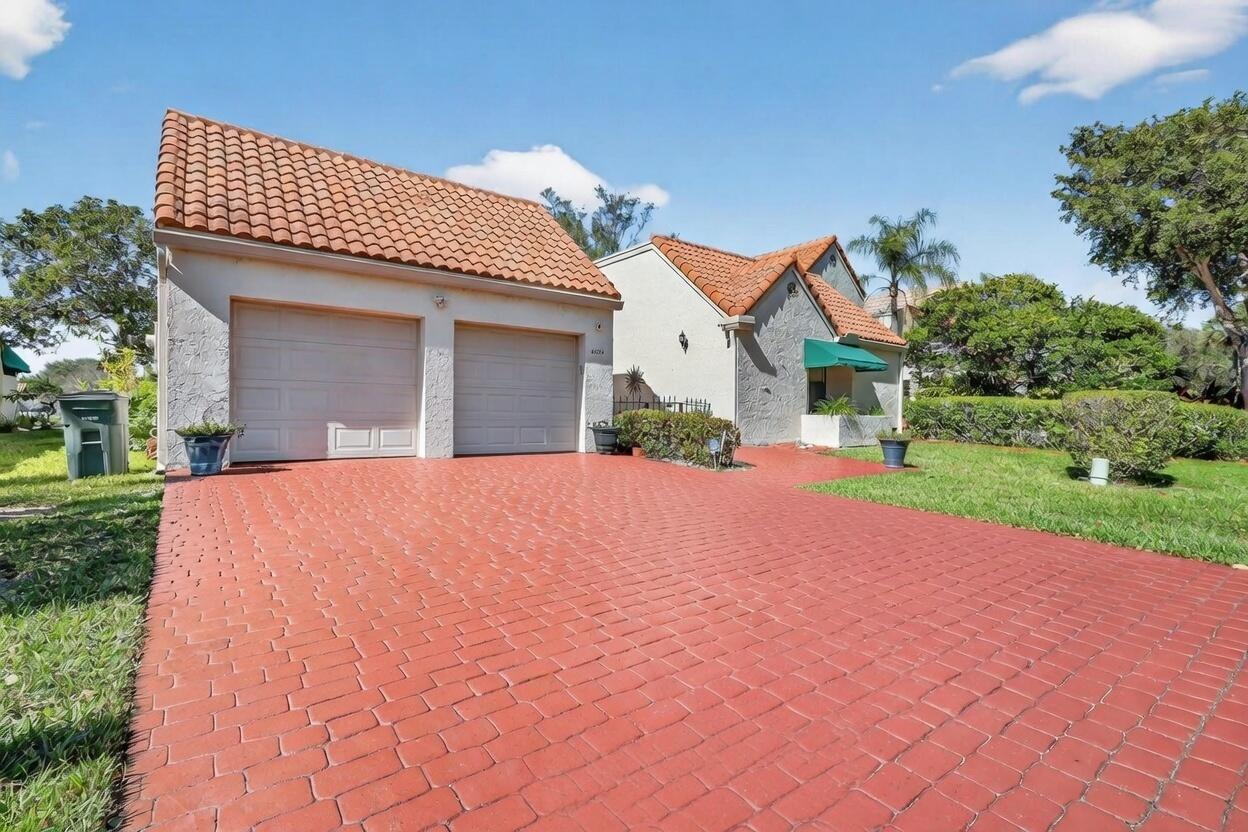 6656 Las Flores Drive Boca Raton, FL 33433 - Photo 1 of 63 driveway2