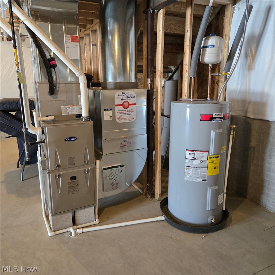15229 Timber Ridge Drive Middlefield, OH 44062 - Photo 27 of 30 NEW MECHANICAL EQUIPMENT. LOCATED IN THE CENTER OF THE HOUSE FOR EXCELLENT HVAC.