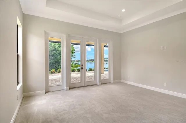 a view of an empty room with glass windows