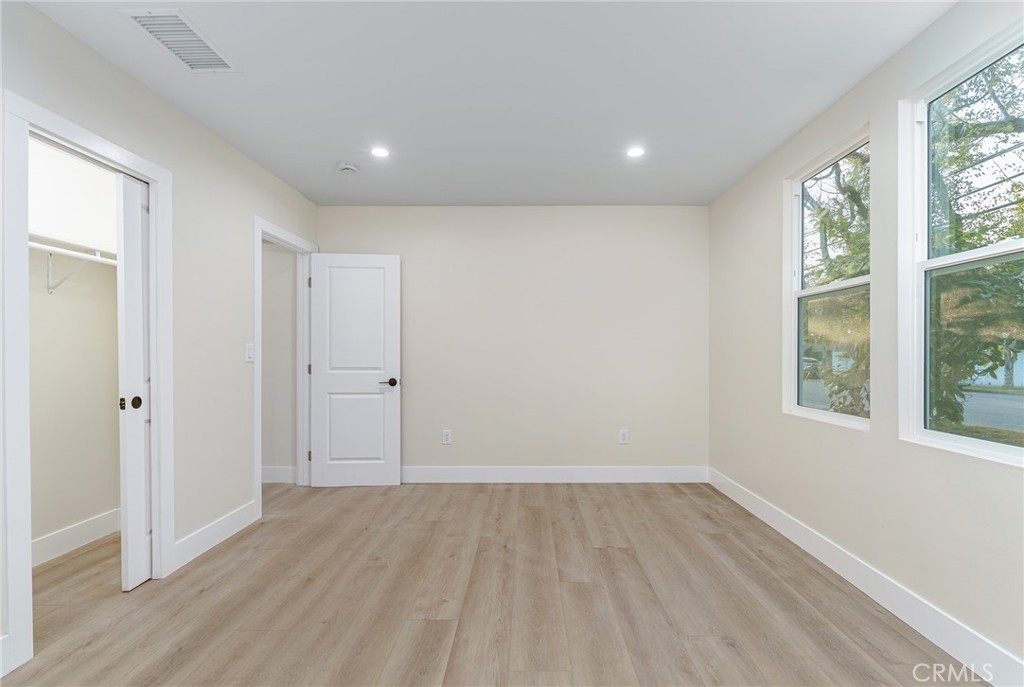 700 West 10th Street Azusa, CA 91702 - Photo 18 of 43 a view of a room with wooden floor and window