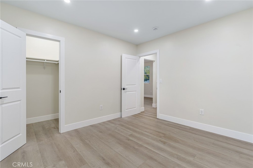700 West 10th Street Azusa, CA 91702 - Photo 20 of 43 wooden floor in an empty room