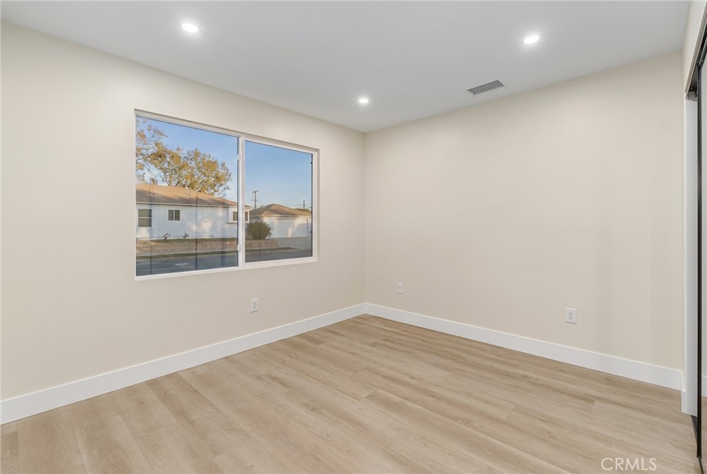 700 West 10th Street Azusa, CA 91702 - Photo 23 of 43 a view of an empty room with a window
