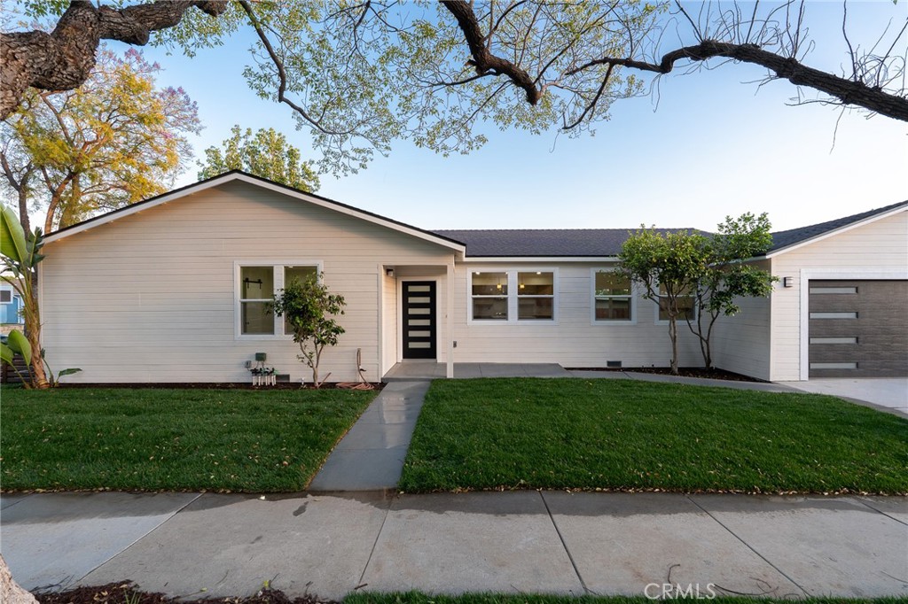 700 West 10th Street Azusa, CA 91702 - Photo 24 of 43 a front view of a house with a yard