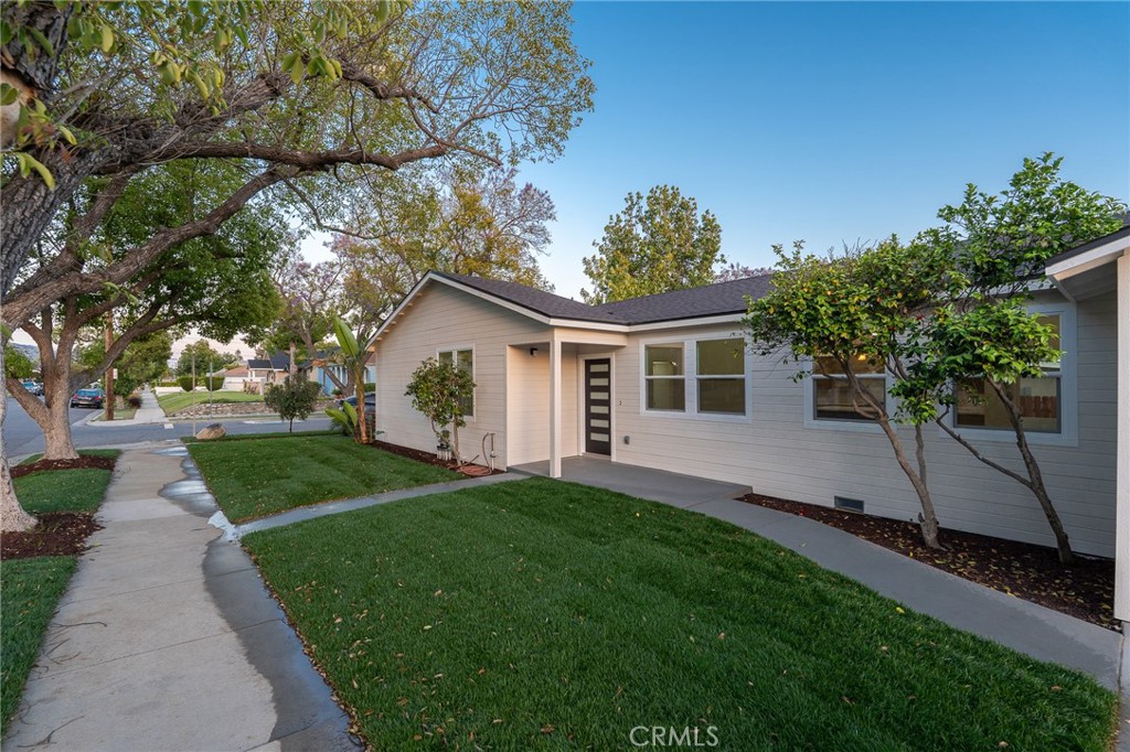700 West 10th Street Azusa, CA 91702 - Photo 25 of 43 a front view of house with yard and green space