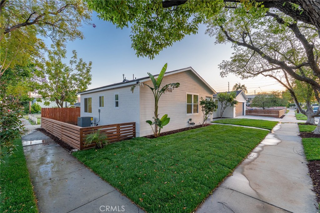 700 West 10th Street Azusa, CA 91702 - Photo 28 of 43 a view of a house with a yard and a patio