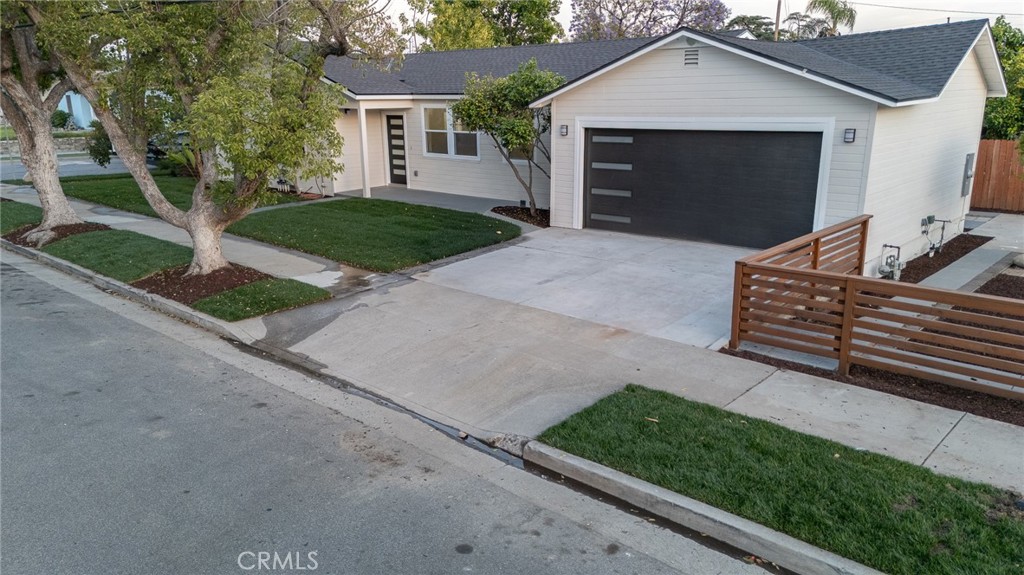 700 West 10th Street Azusa, CA 91702 - Photo 34 of 43 a front view of a house with garden