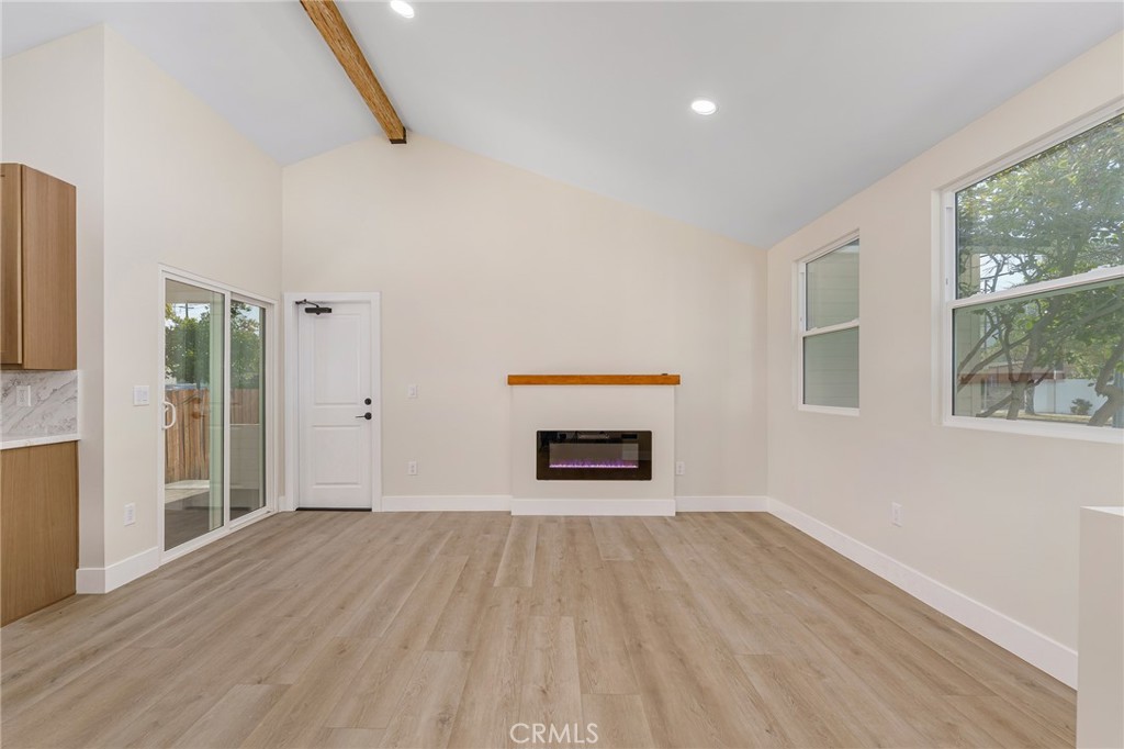 700 West 10th Street Azusa, CA 91702 - Photo 6 of 43 a room with wooden floor and a window