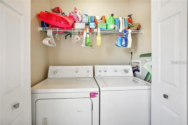 a utility room with dryer and washer