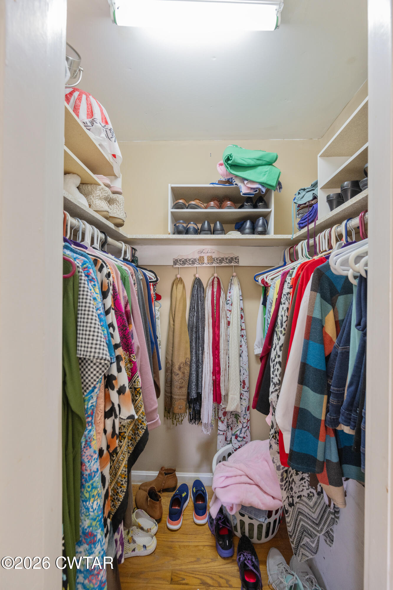 381 Sunset Drive Lexington, TN 38351 - Photo 13 of 26 a view of walk in closet with clothes