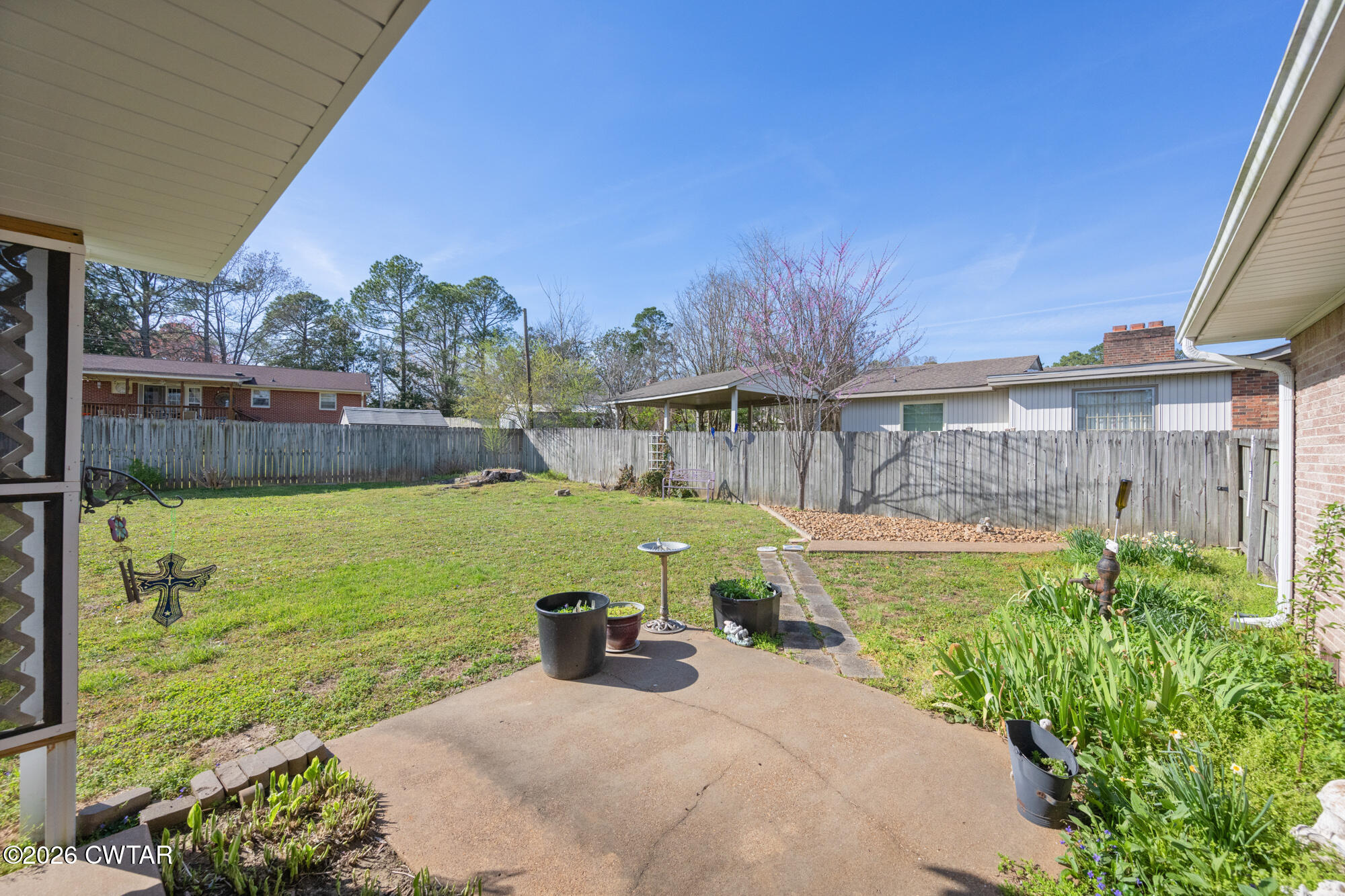 381 Sunset Drive Lexington, TN 38351 - Photo 21 of 26 a view of backyard with seating area and green space