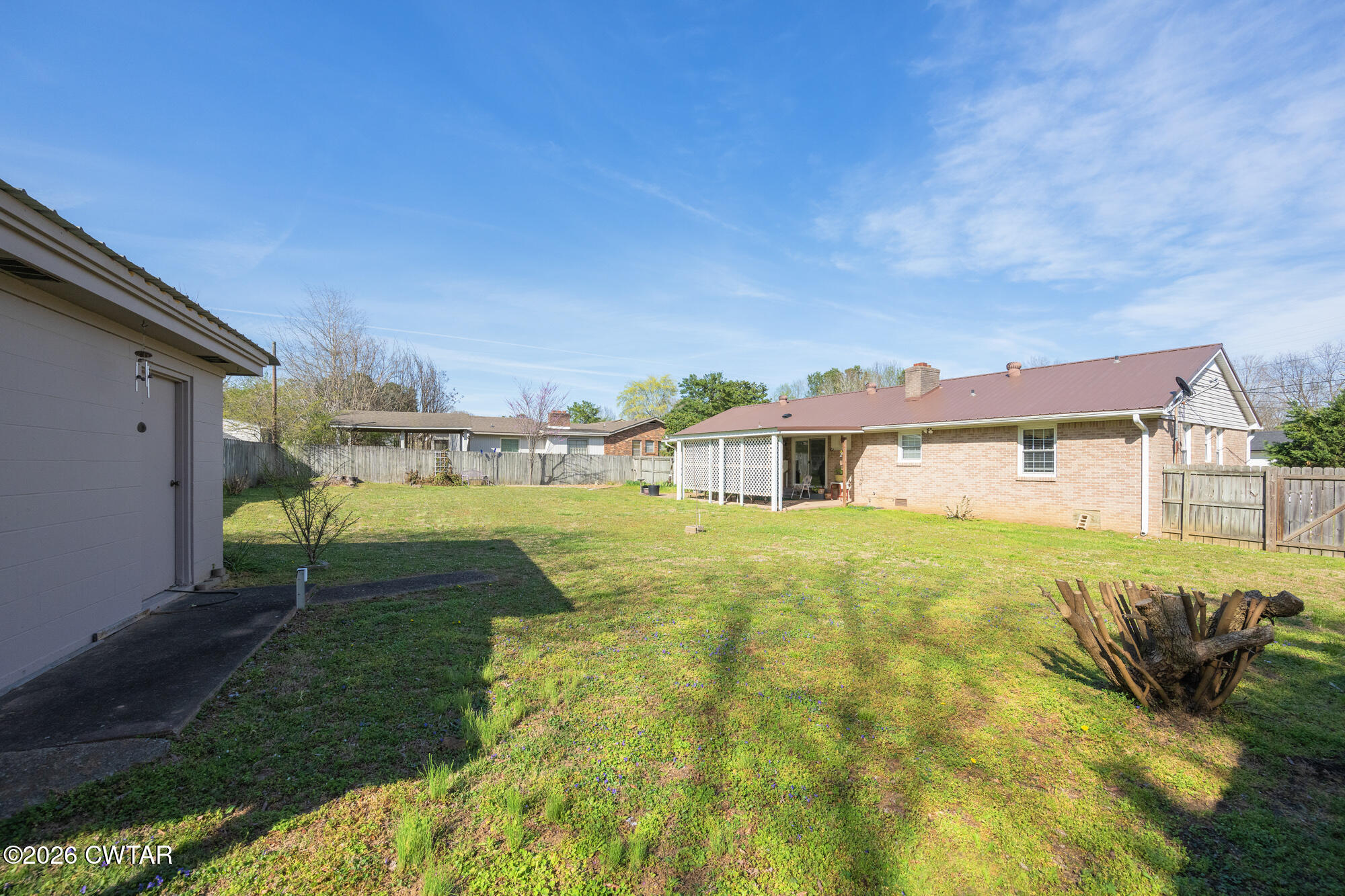 381 Sunset Drive Lexington, TN 38351 - Photo 23 of 26 a front view of a house with a yard