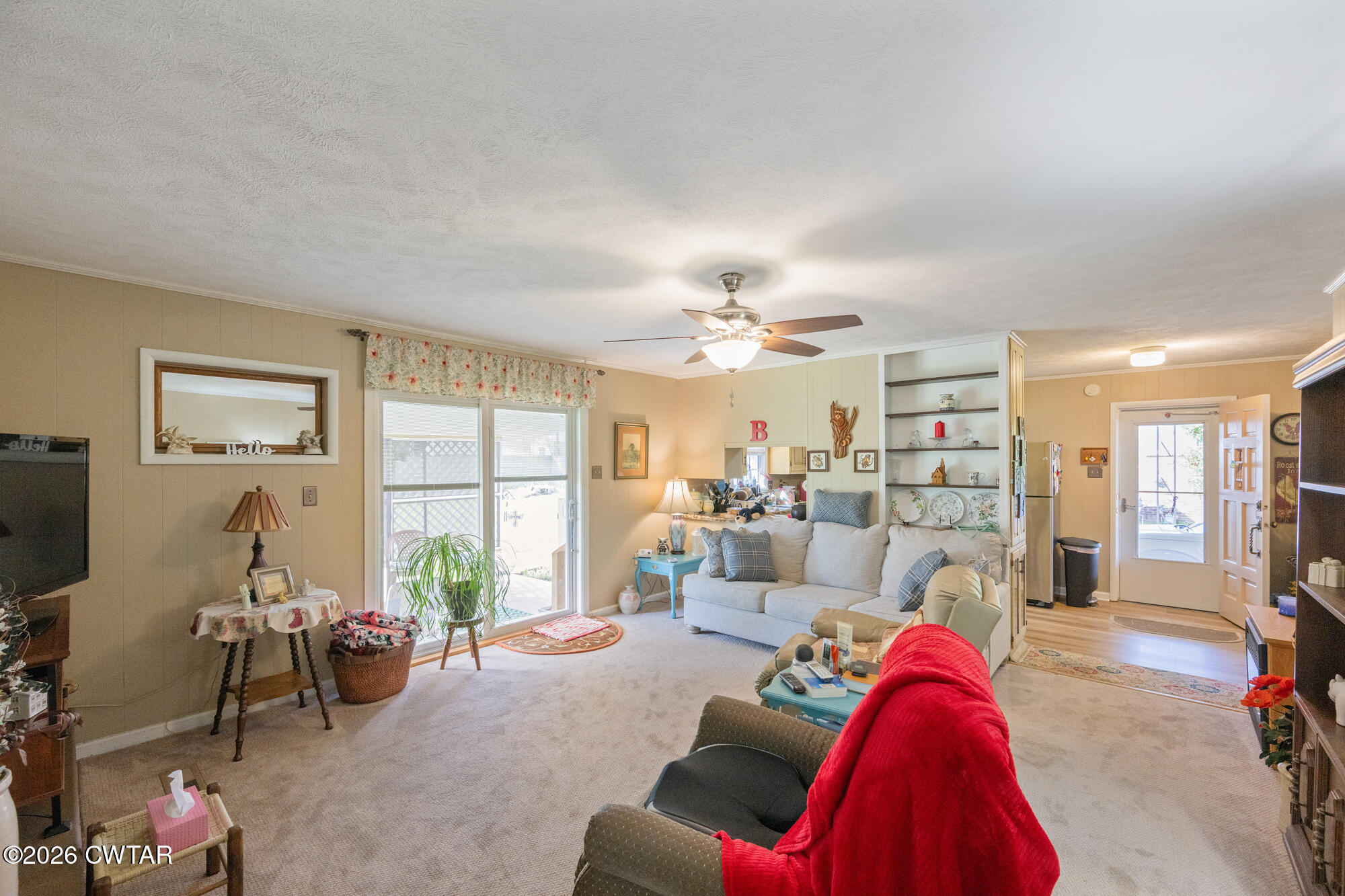 381 Sunset Drive Lexington, TN 38351 - Photo 5 of 26 a living room with furniture and a large window