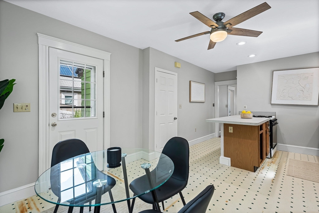 57 Huron Circle Boston, MA 02124 - Photo 20 of 32 a living room with furniture and a window