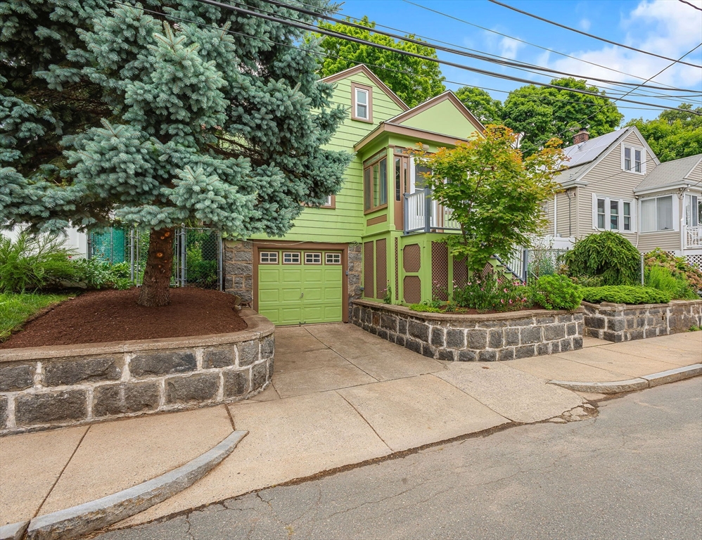 57 Huron Circle Boston, MA 02124 - Photo 2 of 32 a view of a house with a garden