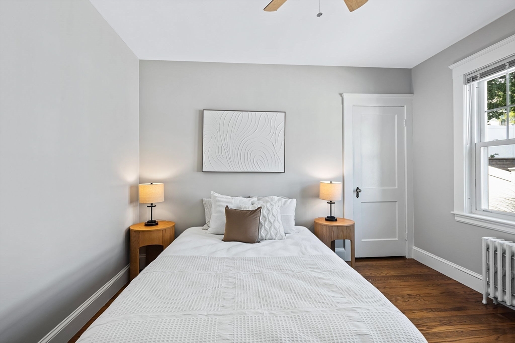 57 Huron Circle Boston, MA 02124 - Photo 25 of 32 a bedroom with bed and window