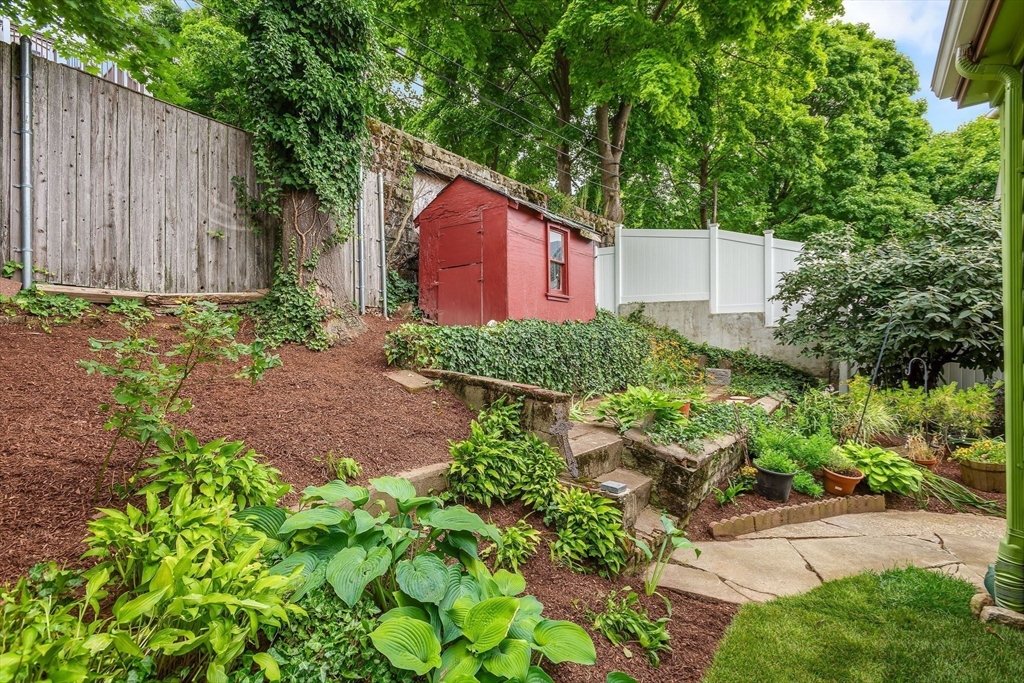 57 Huron Circle Boston, MA 02124 - Photo 29 of 32 a backyard of a house with lots of green space