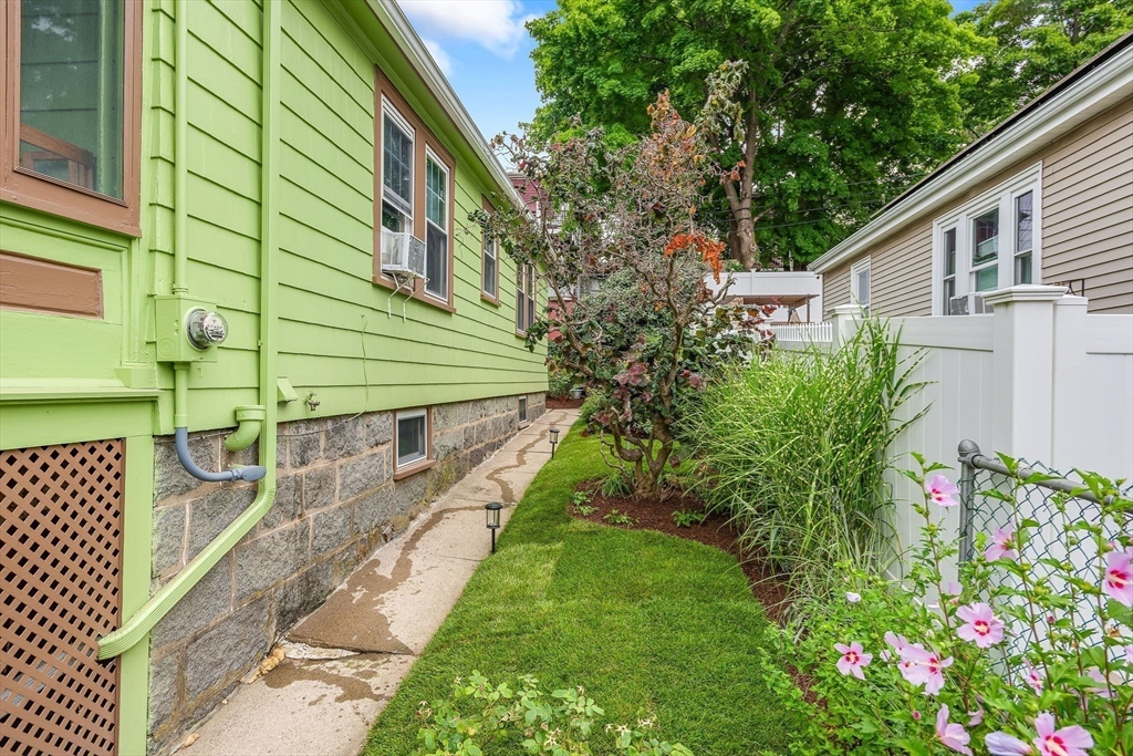 57 Huron Circle Boston, MA 02124 - Photo 30 of 32 a view of a backyard with plants