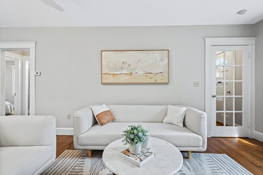 57 Huron Circle Boston, MA 02124 - Photo 8 of 32 a living room with furniture and a couch