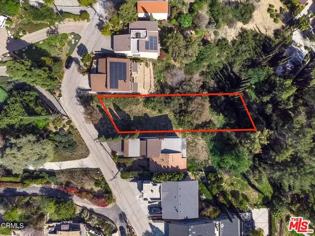 an aerial view of house with yard